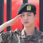 BTS member Jin salutes at the Army's 5th Infantry Division after completing his 18 months of mandatory military service in Yeoncheon, 61 kilometers north of Seoul, South Korea, 12 June 2024.