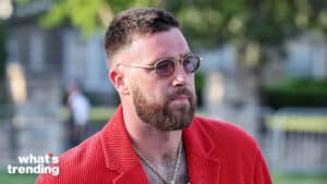 Travis Kelce walks behind the red carpet at the Kansas City Chiefs Super Bowl Ring ceremony at the Nelson Atkins Museum of Art in Kansas City, MO. The Chiefs defeated the San Francisco 49ers 25-22 to win Super Bowl LVIII