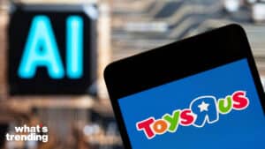 In this photo illustration, the American multinational toy chain ToysRUs (Toys 'R' Us) logo seen displayed on a smartphone with an Artificial intelligence (AI) chip and symbol in the background.
