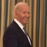 Joe Biden grin meme