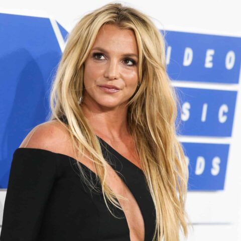 Singer Britney Spears wearing a Julien MacDonald dress, H Stern jewels, and Christian Louboutin shoes arrives at the 2016 MTV Video Music Awards held at Madison Square Garden on August 28, 2016 in Manhattan, New York City, New York, United States.