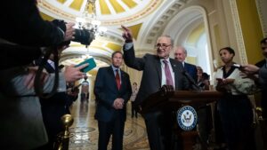 Senate Majority Leader Chuck Schumer calls on a reporter for a question during Senate Democrats' weekly press conference outside the Senate chamber, Washington, DC, July 30, 2024. The discussion focused on efforts to pass a bill protecting children from social media.