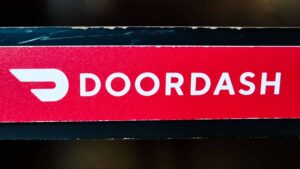 Doordash logo sign is seen in a restaurant in Chicago, United States, on October 17, 2022.