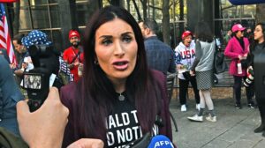 Donald Trump supporter and political activist Laura Loomer speaks outside Manhattan criminal court as the former president arrives for the first day of his criminal trial in New York, on Monday, April 15, 2024. Trump, the first former president to stand trial on criminal charges, is charged with 34 counts of falsifying business records to allegedly cover hush money payments to adult-film star Stormy Daniels in 2016.