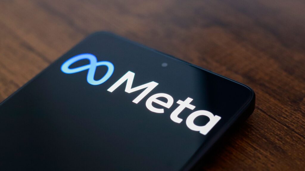 In this photo illustration, the Meta Platforms, Inc. logo is displayed on a smartphone screen.