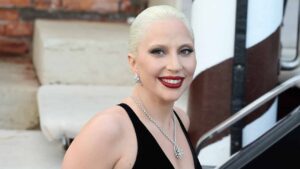 Lady Gaga and her fiance make a stylish entrance at the Hotel Excelsior, arriving for the Venice Film Festival.