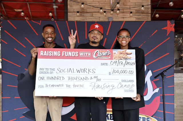 A big check for a big heart! Chance the Rapper accepts a $100,000 donation from Raising Cane’s for his nonprofit, SocialWorks, during an appearance at a Chicago-area Restaurant, September 12, 2024.