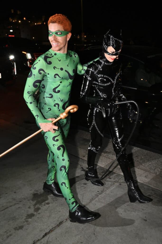 Newly engaged Nina Dobrev and Shaun White attend a Halloween party dressed as Catwoman and The Riddler at Chateau Marmont in LA.