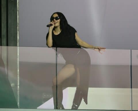 Charli XCX performed a secret concert featuring songs from her album 'Brat' for H&M in front of thousands of fans at Times Square in New York City on Monday, November 18, 2024.