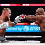 Jake Paul and Mike Tyson fight during LIVE On Netflix: Jake Paul vs. Mike Tyson at AT&T Stadium on November 15, 2024 in Arlington, Texas.