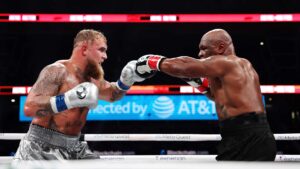 Jake Paul and Mike Tyson fight during LIVE On Netflix: Jake Paul vs. Mike Tyson at AT&T Stadium on November 15, 2024 in Arlington, Texas.