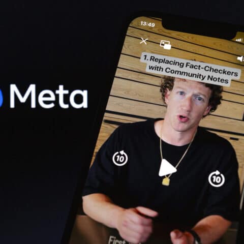 ''We're going to get rid of fact-checkers and replace them with Community Notes similar to X, starting in the U.S.,'' Meta CEO Mark Zuckerberg said in a video posted on Tuesday, as seen on a smartphone backdropped by Meta Platforms logo.