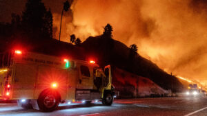 Fire broke out on January 7, 2025, as seen from the PCH (Pacific Coast Highway) in the affluent town of Pacific Palisades, on the edge of Malibu, CA, due to unusually strong Santa Ana winds that exceeded 100 MPH