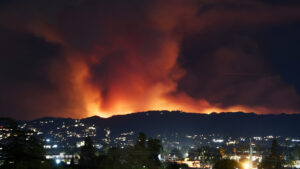 The Palisades fire explodes looking like a volcano in the Santa Monica mountains into the San Fernando Valley causing evacuations Friday, Van Nuys