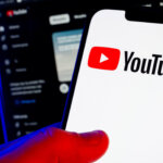 In this photo illustration, a Youtube logo seen displayed on a smartphone.