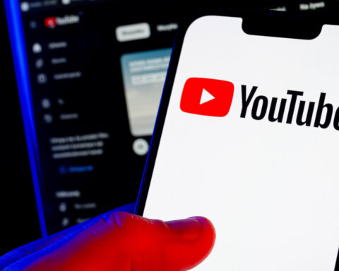 In this photo illustration, a Youtube logo seen displayed on a smartphone.