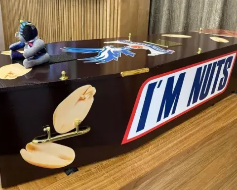 Paul Broome's Snickers-themed coffin. Photo: SWNS