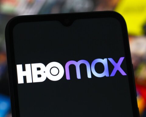 In this photo illustration, the HBO Max logo is seen displayed on a smartphone screen.