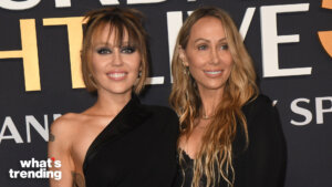 Miley Cyrus and Tish Cyrus posing together at a What's Trending event.