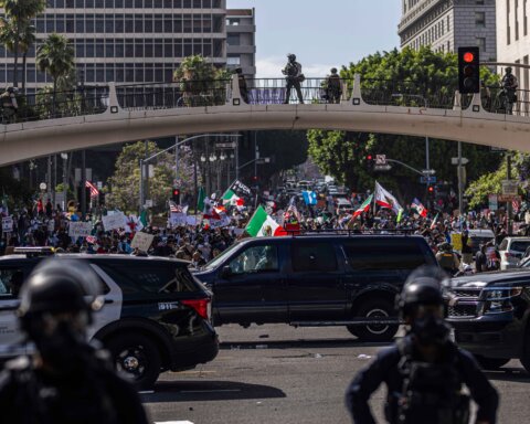 Anti-ICE protesters face off with law enforcement following the ''No Kings'' protest in downtown Los Angeles, United States, on June 14, 2025.
