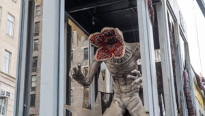 Demogorgon monster figure from Stranger Things displayed in a city street installation