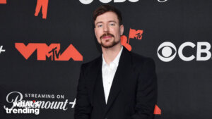 MrBeast posing on the red carpet at the MTV Video Music Awards event.