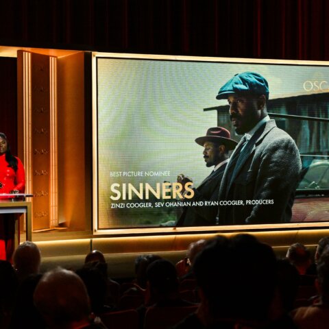 Presenters announcing the Best Picture nominee "Sinners" at the Oscars ceremony.