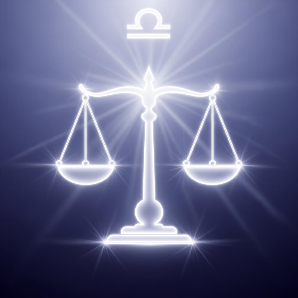 Glowing white Libra zodiac scales symbol on a dark blue background with radiant light effects.