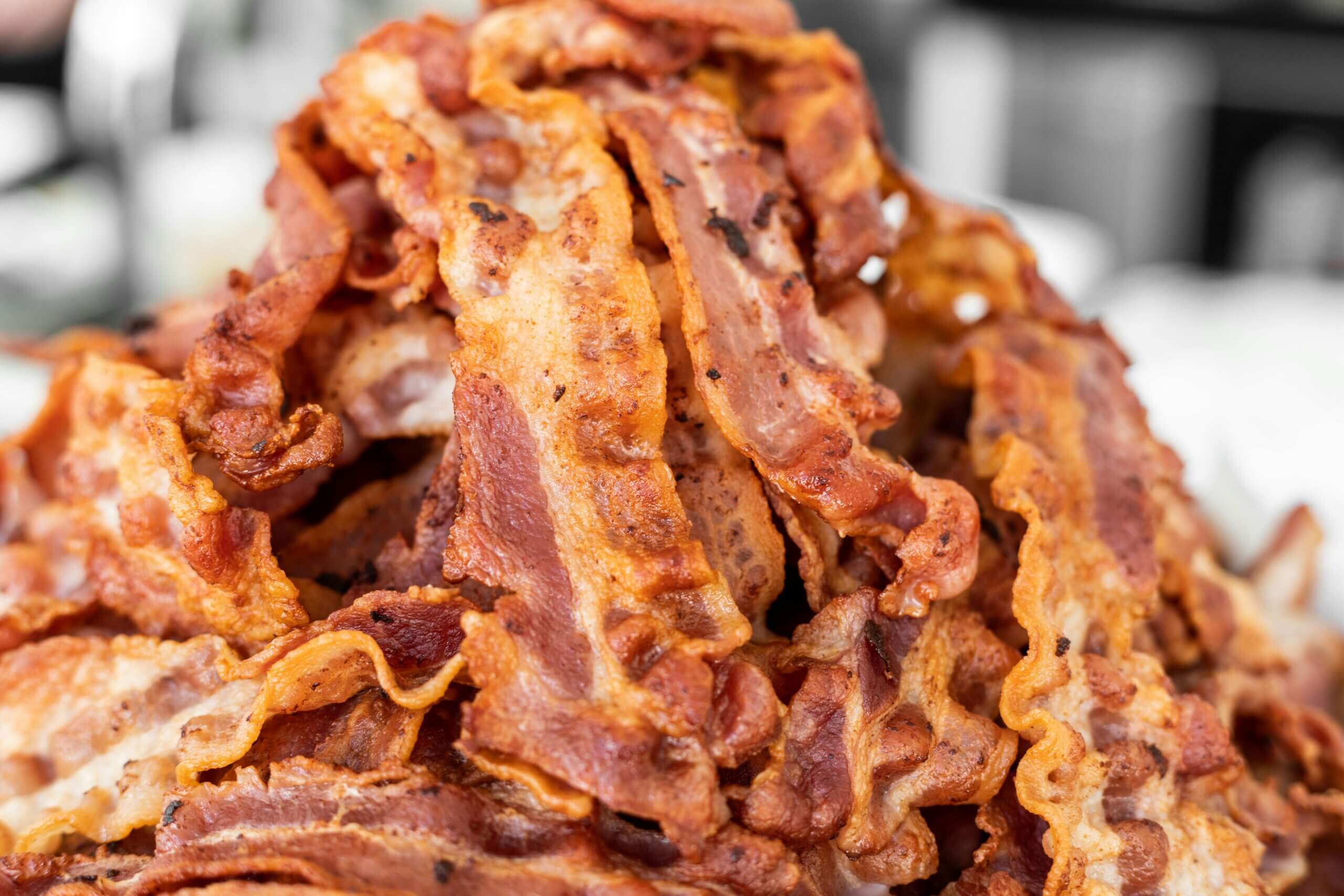 Pile of crispy cooked bacon strips