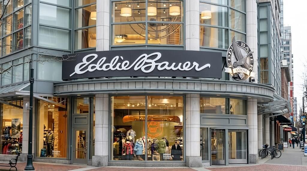 Eddie Bauer retail store exterior with large signage and window displays of outdoor clothing and gear.