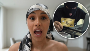 Woman with headscarf looking shocked with inset of masked thief holding an American Express credit card near a laptop