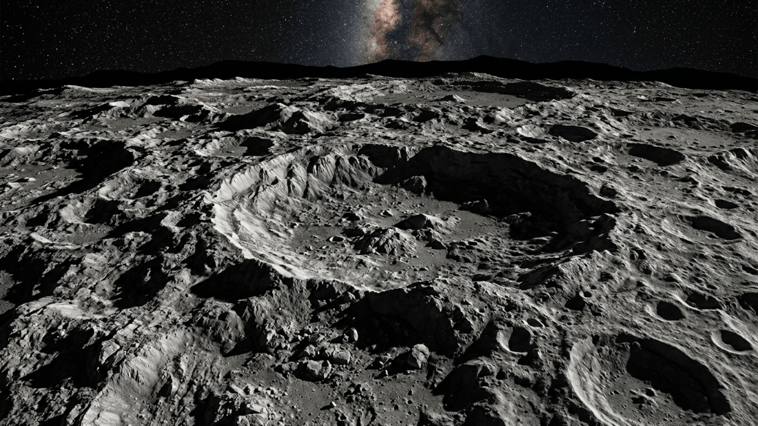 Detailed lunar surface with large craters under a starry sky and the Milky Way visible on the horizon.