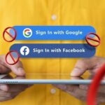 Person holding tablet with disabled sign-in options for Google and Facebook accounts.