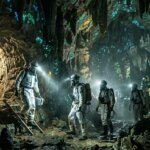 Four explorers in protective suits with headlamps inside a glowing bioluminescent cave