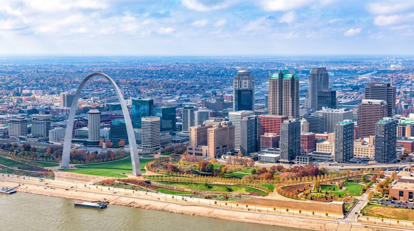 Aerial view of the Gateway Arch and downtown St. Louis skyline along the Mississippi River.