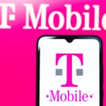 T-Mobile logo displayed on a smartphone screen with a pink T-Mobile background