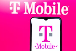 T-Mobile logo displayed on a smartphone screen with a pink T-Mobile background