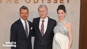 Matt Damon, Christopher Nolan, and Anne Hathaway posing at The Odyssey event