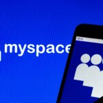 Myspace logo displayed on a blue background and partially on a smartphone screen.