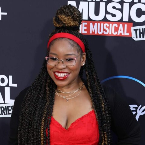 Actress Dara Reneé smiling on the red carpet at the High School Musical: The Musical: The Series premiere
