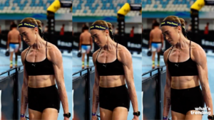 Athlete in black Puma sportswear and "The Feed" headband preparing at an indoor sports event.